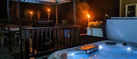 Night time entertainment on our deck is unmatched with our Hot tub, Fire Pit, and Grill Gazebo