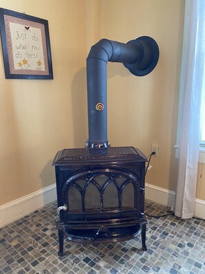 Cozy up by the stove after a day on the slopes!