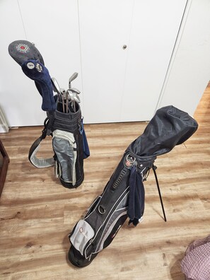 Two golf clubs available for guest use