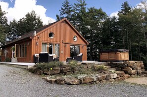 Hot tub, fire pit and outdoor seating.