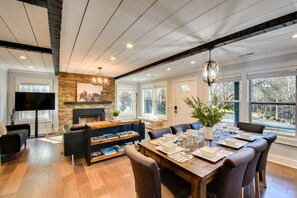 Living Room | Smart TV | Fireplace | Dining Area