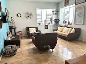 Spacious living room is great for watching TV, playing games or sharing your day