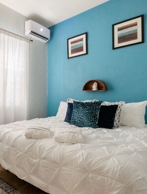 A king bed. Bedroom comes with robes, slippers and phone charging stations too!