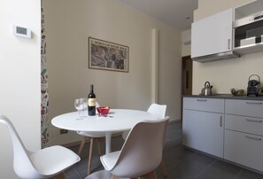 Kitchen with table and air conditioning