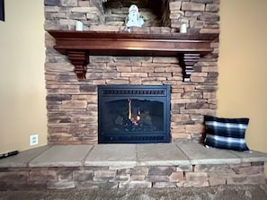 Upstairs living room fireplace - gas insert.