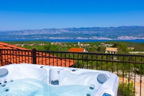 Private hot tub on the terrace of a Luxury villa for vacation on Krk island