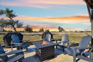 Gather around the firepit on a chilly evening.