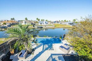Pool and canal view from Master bedroom balcony.