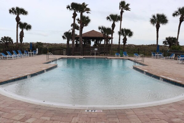 Gorgeous infinity pool with fountains just steps from the beach