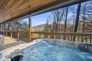 Enjoy breathtaking views of Cove Mountain from our 3-person hot tub