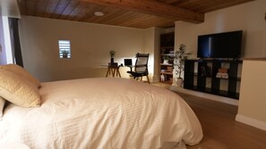 Step into this serene bedroom retreat that effortlessly combines comfort & style