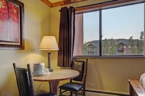 Take a seat and enjoy the mountain views from your hotel room.