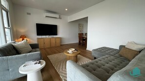 Lounge room with Large screen TV and air-conditioning