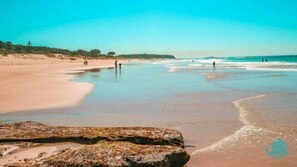 Sandy shorelines of sun and fun and surf