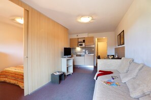 Sink into the cozy sofa after a day exploring the area.