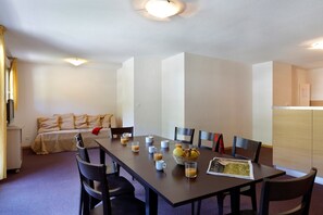 Loads of room at the dining table and the open-concept is always nice for the cook.