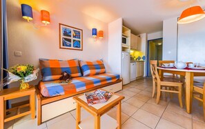 Relax and unwind in the cozy living room.