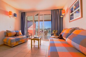 Sink into the cozy sofa after a day exploring the area.