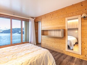 Relax on the comfy bed after a day outside.