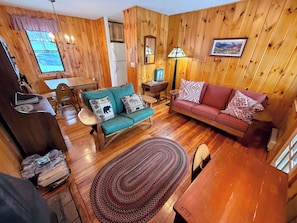 While a small cabin, the home feels spacious and cozy, and has that rustic mountain feel that will make you feel like you're a world apart from home