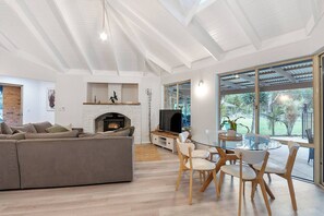 Enjoy meals together in the warm, inviting dining room, perfect for family dinners and cozy meals. (1)