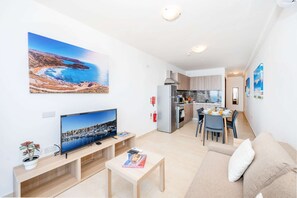 Living room, kitchen and dining area