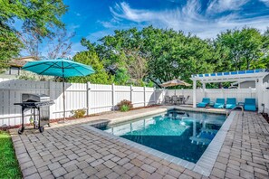 Dive into a world of private pool perfection! Enclosed by serenity, our spacious pool oasis is your exclusive escape. With a grill for sizzling delights, an outdoor dining table for al fresco feasts, and lounge chairs under swaying palm trees, every moment by the pool is a celebration of coastal bliss.