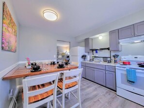 Dining table and chairs are bar-height