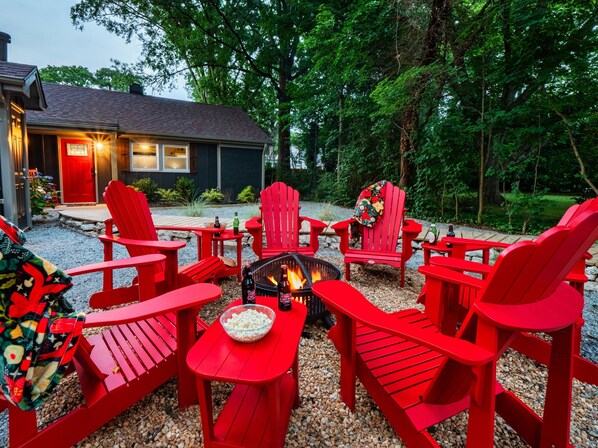 Unwind in our charming Adirondack chairs while you indulge in s'mores by the fire. 