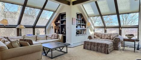 Bask in the sunlight in our spacious living room, filled with ample seating for all.