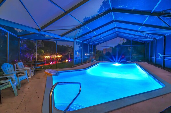 Evening swim vibes with pool lights.