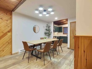 Gather the family around our inviting wooden dining table, where every meal becomes a cherished moment.