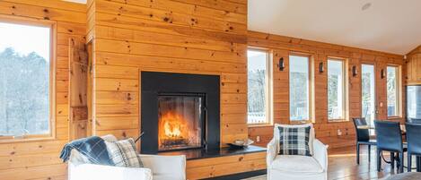 Immerse into the warmth of the fireplace