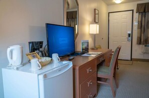 There is a convenient work desk and chair, along with a mini-fridge in-room.