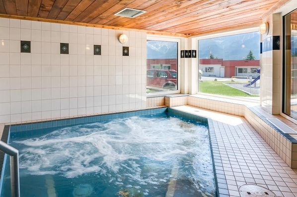 Soak in this lovely, mountain view hot tub after a day outside!