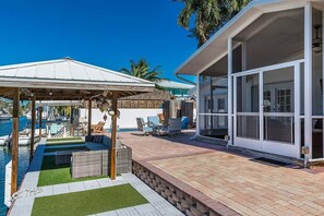 Screened-in porch and Tiki