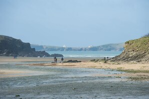 In less than a minute's walk, you can reach the beautiful Porth Beach
