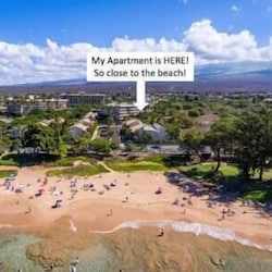 Stay steps from the beach at 'The Maui Banyan'—perfect location for a relaxing seaside escape.