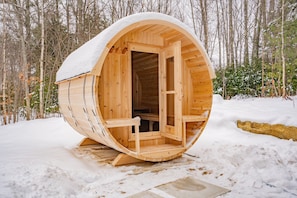 Inviting warmth emanates from the brand new barrel sauna!