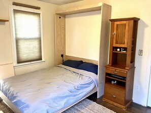 bedroom #2 w/ murphy bed. 
If wanted can be folded up and used as office space.