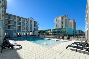 Dive into our sparkling zero entry pool, or lounge on the spacious sun deck, offering fun for the whole family. Gather with fellow guests and enjoy the camaraderie at our inviting shared pool area.