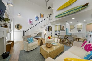 OPEN, TASTEFUL LIVING AREA W HIGH CEILINGS AND SEATING FOR ALL