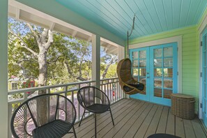 PRIVATE, GENEROUS BALCONY WITH SEATING AND SWINGS