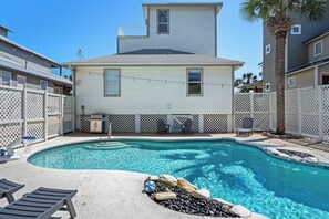 There is a private, heated pool in the fully fenced backyard. Unlike other nearby rentals, heating the pool is FREE! Around the pool, there are lounge chairs, and a large gas grill - your priv