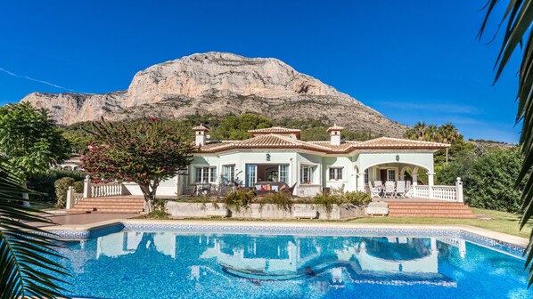 House and Pool with Mountain Backdrop