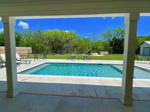 FRIO WAVES - Large deep water pool overlooking private, high fenced backyard with rock fire pit and entertainment area.