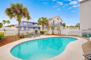 PRIVATE HEATED POOL: There is a private, heated pool in the fully fenced backyard. Unlike other nearby rentals, heating the pool is FREE! Around the pool, there are lounge chairs, and a large