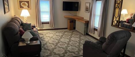 spacious livingroom with 55" TV, free internet to stream your favorite programs