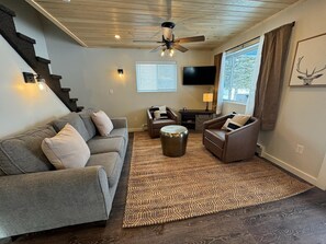 Relax in the spacious living room after a day of outdoor adventures