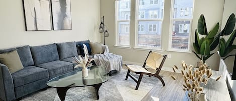 Welcome to our cozy retreat in the heart of Athens, GA! Unwind in our stylish living room after a long day out and about.
